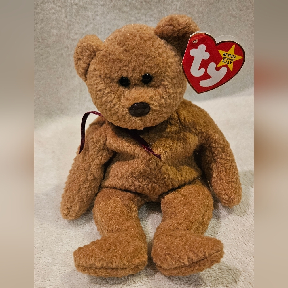 CURLY BEANIE BABY